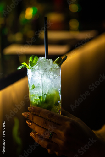 hand holding mojito