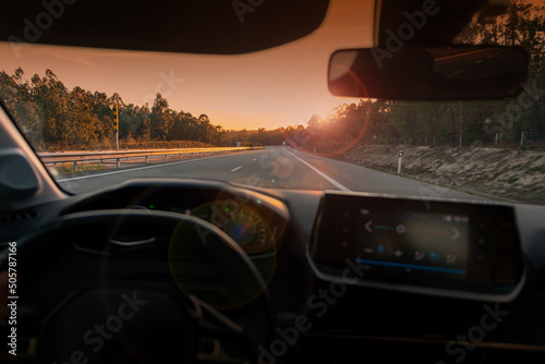 Driving in Portugal, afternoon view from inside a car to scenic panoramic view of driver POV of the road landscape.