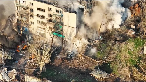 Russian tank destroys civilian building. Tank blows up the house. Mariupol, Ukraine war.