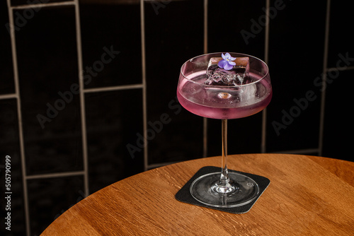 Obraz na płótnie Aviation, drink with gin, lemon juice,maraschino liqueur and violet cream liqueur standing on bar counter w salonie