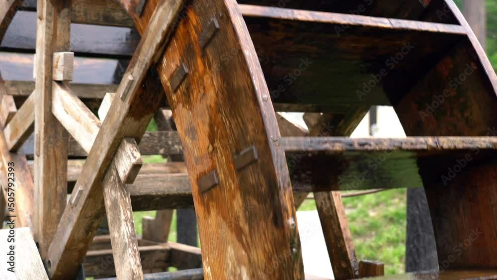 Nagano, Japan - May 17, 2022: Wooden water wheel or water mill for sightseeing in Japan
Nagano, Japan - May 17, 2022: Wooden water wheel or water mill for sightseeing in Japan