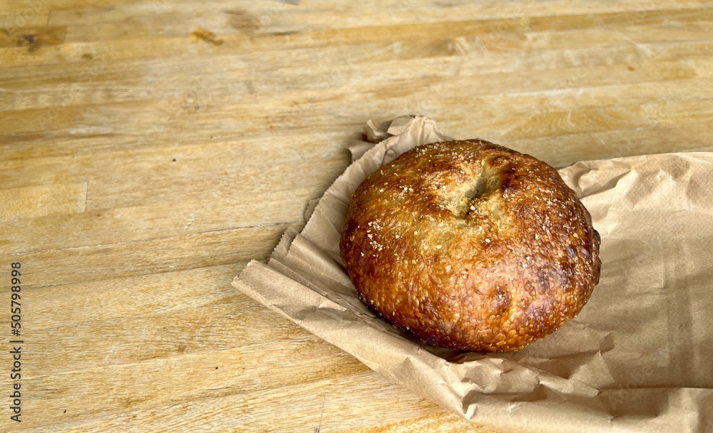 Close up of a plain fresh bagel with a shallow depth of field and copy space Close up of a plain fresh bagel with a shallow depth of field and copy space