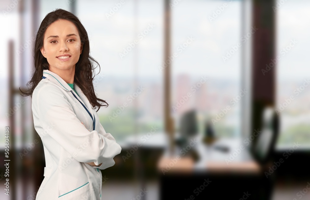 Dental doctor. Smiling Middle Dentist Doctor Stomatologist Standing With Folded Arms In Clinic Interior Dental doctor. Smiling Middle Dentist Doctor Stomatologist Standing With Folded Arms In Clinic Interior