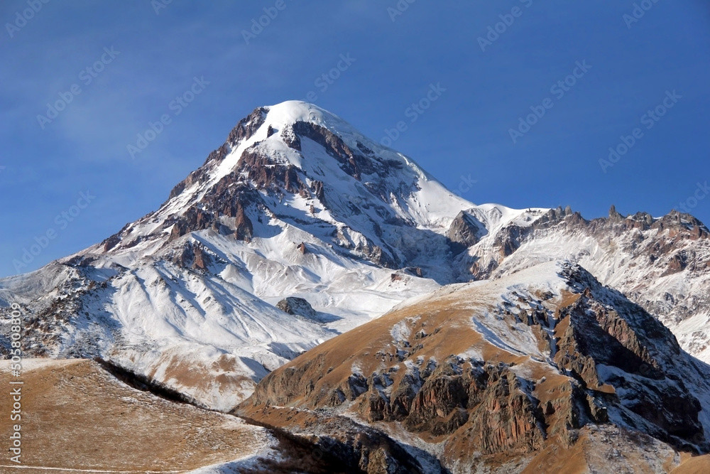 Mountain peak at day landscape. Snow on mountain peak. Landscape of mountain peak. Mountain peak snow over blue sky in winter
