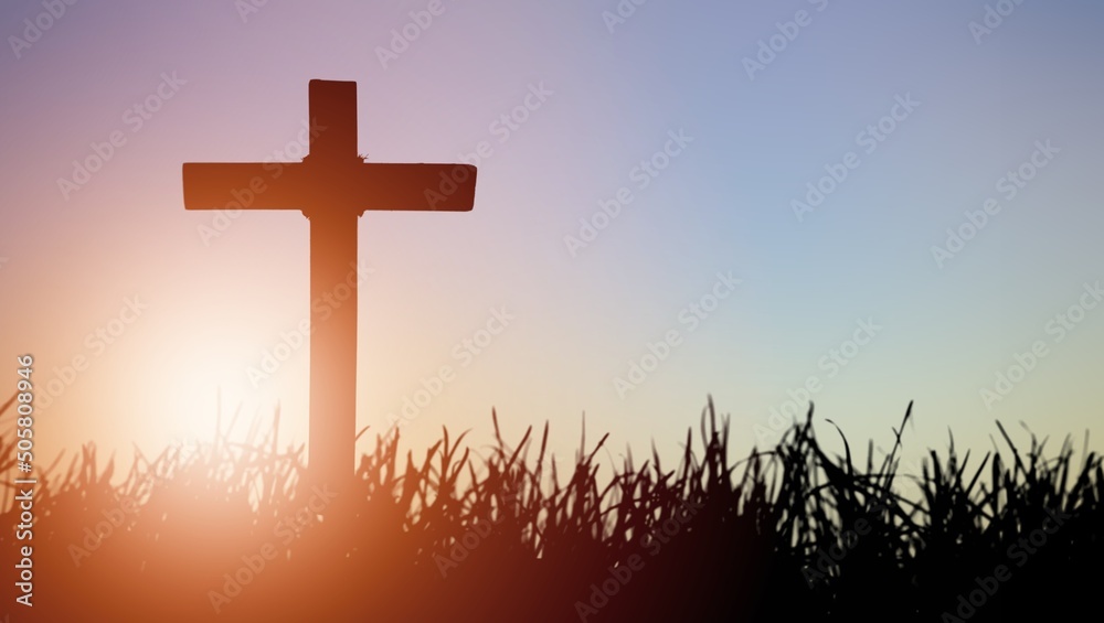 Shining holy cross of jesus christ in grass