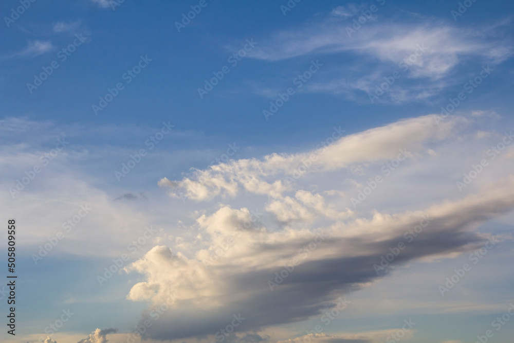 Atmosphere in the evening sky with a variety of beautiful colors and shapes to imagine and there are many clouds that float to the air similar to Return a large plane that flew by.