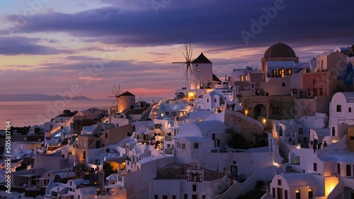 The sunset view point out look of the landmark view in Oia, Santorini. Image of famous village Oia located at one of Cyclades island of Santorini, South Aegean, Greece.