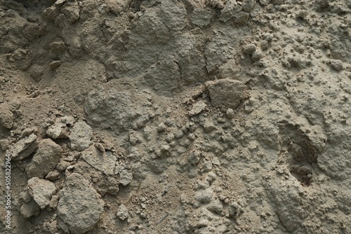 Graue Sandhügelfläche mit Muster 