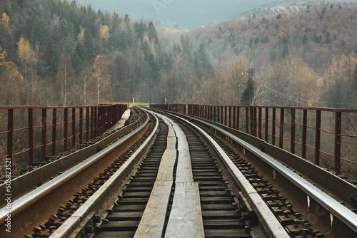 Concept of travel and adventure, railroad in mountains