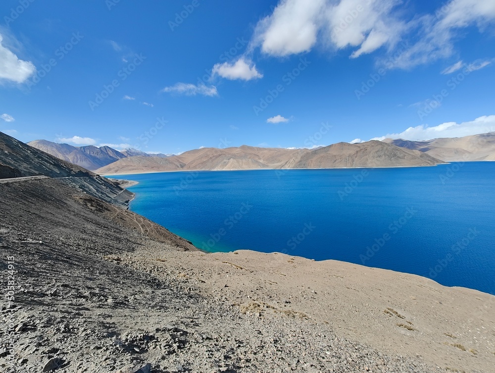 Pangong Blue lake in ladakh, India Kashmir, Jammu, Pangong near India China Border Blue Water and Clear Sky with Mountians