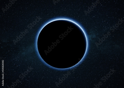 Fotografiet Blue glow planet earth and eclipse in deep starry space