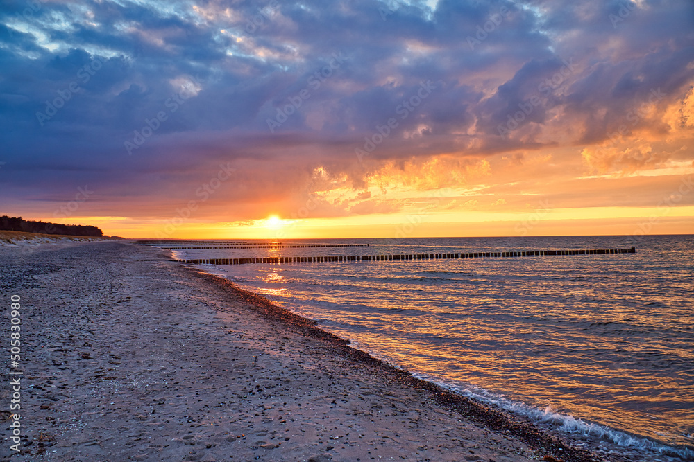 Sunset on the Baltic Sea. Sea, bean strong colors. Vacation on the beach. Landscape