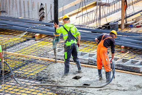 Concrete pouring on the construction site.