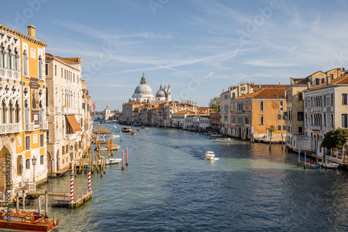 Beautiful view on Grand Canal from Accademia bridge with San Giorgio Maggiore church on the background in Venice. Italian landmarks and traveling Italy concept. Cityscape in autumn sunny day © rh2010