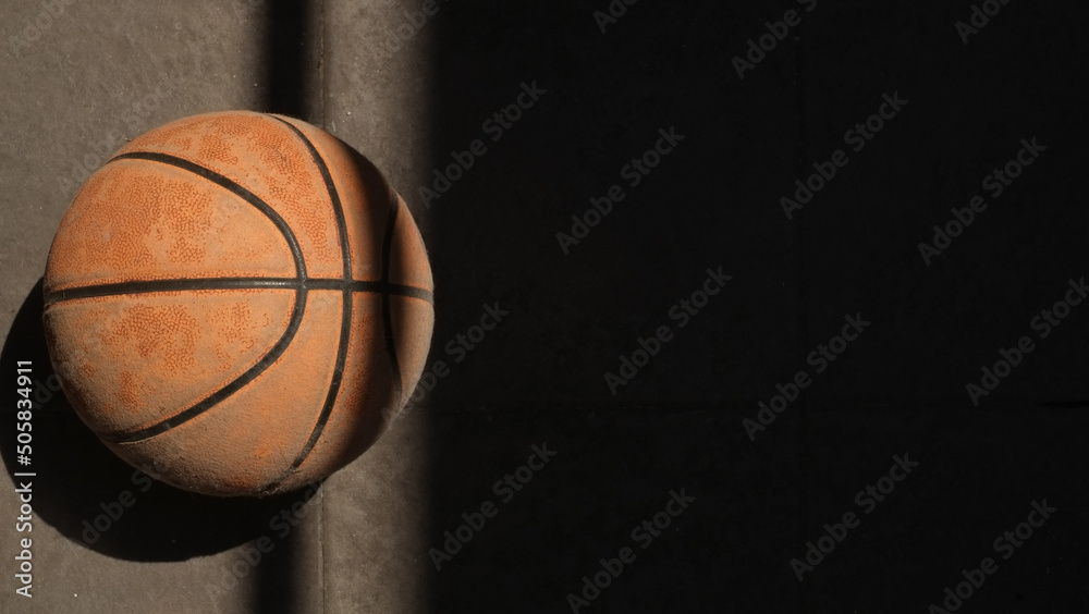a basket ball on shadow