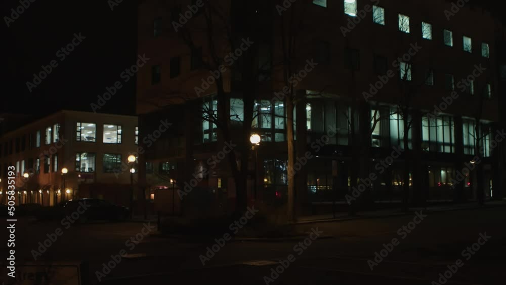 Office looking building on dark evening in the city Office looking building on dark evening in the city