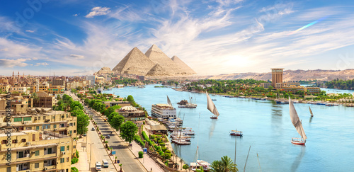Aswan downtown with sailboats, panoramic view on the Nile, Egypt photo