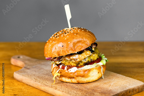 fresh tasty burger on table. american hamburger