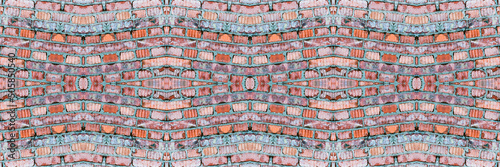 Seamless red brick mosaic, stone wall texture for background.