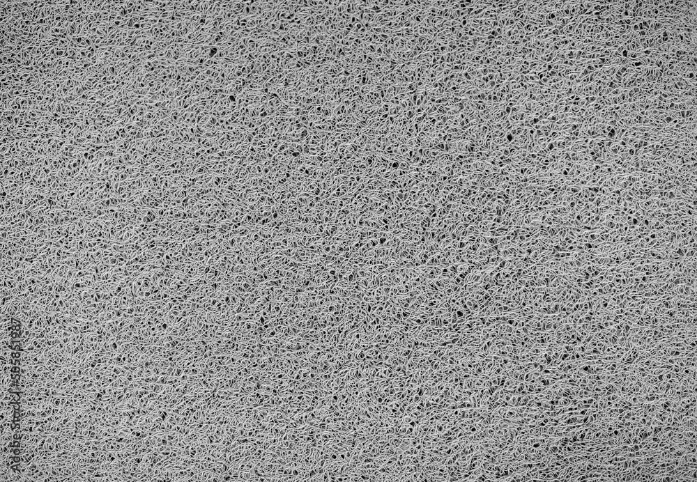 Gray concrete wall. The texture of the old plaster wall is interesting. Design background. Gray concrete wall. The texture of the old plaster wall is interesting. Design background.