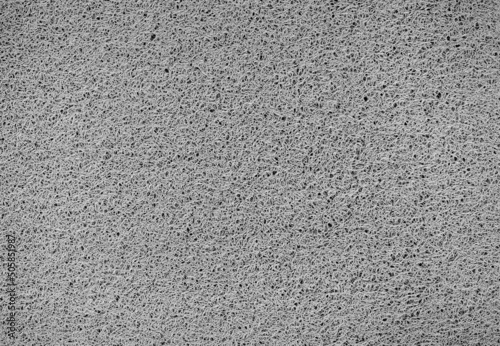 Gray concrete wall. The texture of the old plaster wall is interesting. Design background.