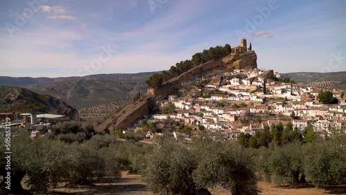 Slow motion pan over beautiful village of Montefrio in Andalusian countryside photo