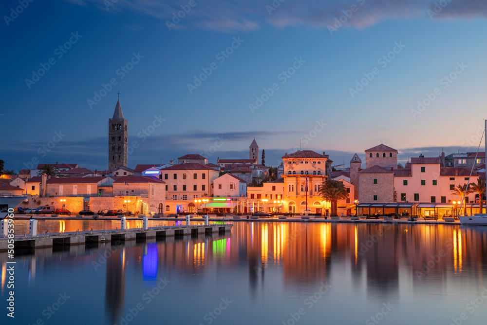 Rab, Rab Island, Croatia. Cityscape image of iconic village Rab, Croatia located on Rab Island at sunset.