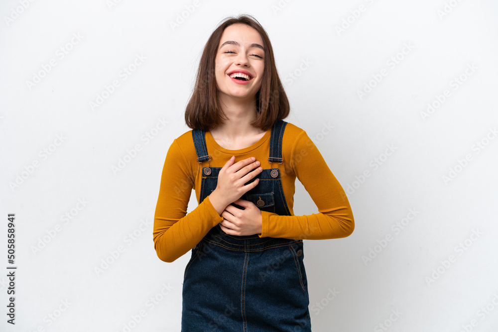 Young Ukrainian woman isolated on white background smiling a lot