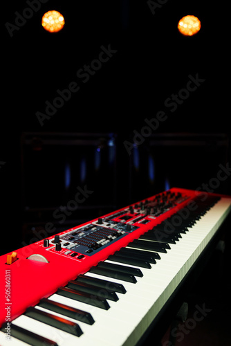 Close-up of an electronic synthesizer on a dark background