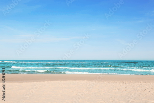 Picturesque view of beautiful sea and sandy beach on sunny day © New Africa