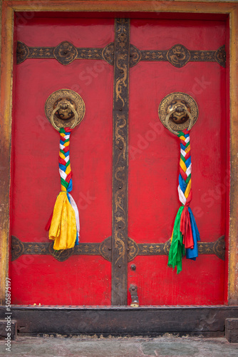 Red door at Palcho Monastery, Tibet photo