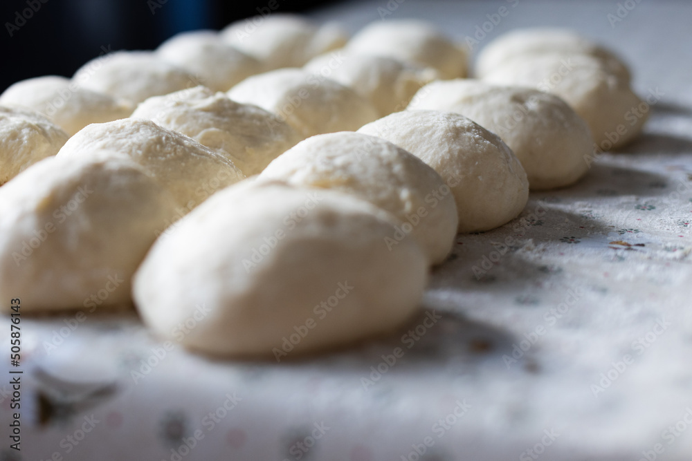 Balls from the dough for pies. Baking at home. Selective focus.