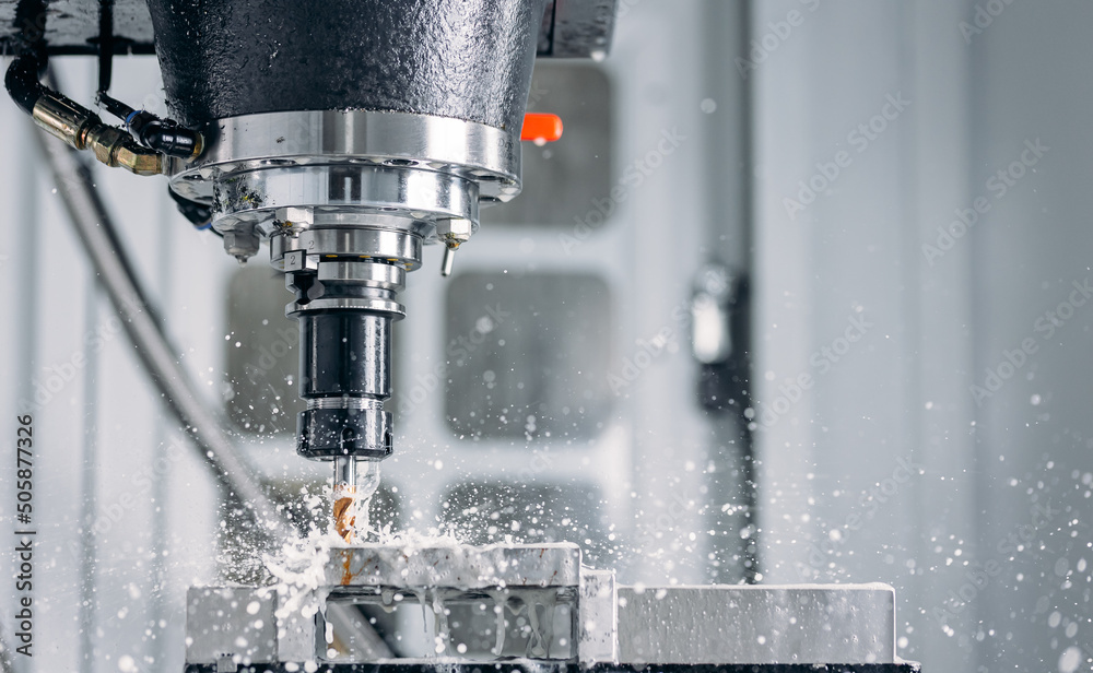 © Parilov - Working closeup CNC turning cutting metal Industry machine iron tools with splash water © Parilov - Working closeup CNC turning cutting metal Industry machine iron tools with splash water