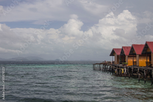 Borneo landscape. Bamboo huts on stilts above the water at Mabul island, Borneo, Sabah, Malaysia