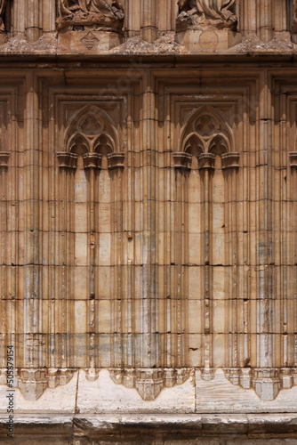 Blind tracery arcade with lancet arches at the gothic chuch in the old town of Castello d   Empuries  Catalonia in Spain