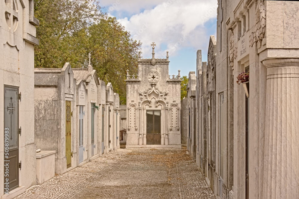 Old grave monuments in Alto de Sao Jao cemetery in Lisbon, Portugal.