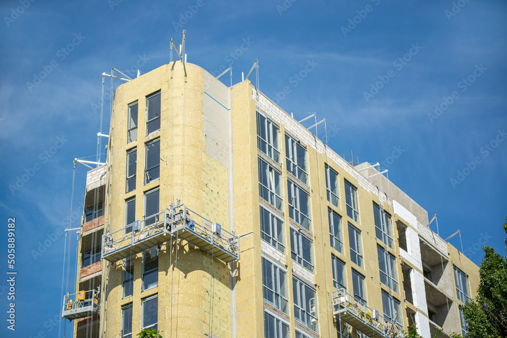 Building external wall thermal insulation with mineral wool. Exterior