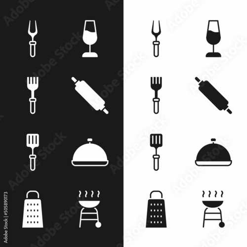 Set Rolling pin, Fork, Barbecue fork, Wine glass, spatula, Covered with tray of food, grill and Grater icon. Vector
