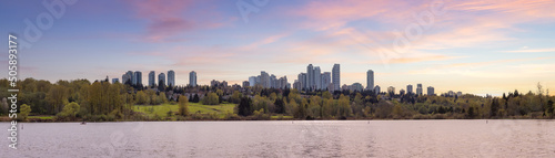 Scenic view of a modern city park by the lake. Spring Season. Deer Lake, Burnaby, Vancouver, British Columbia, Canada. Panorama. Sunset Sky Art Render photo