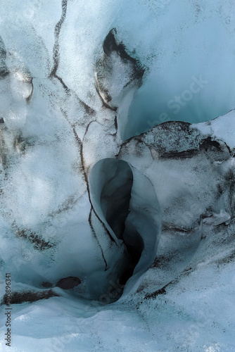 Glacier ice covered in volcanic ash