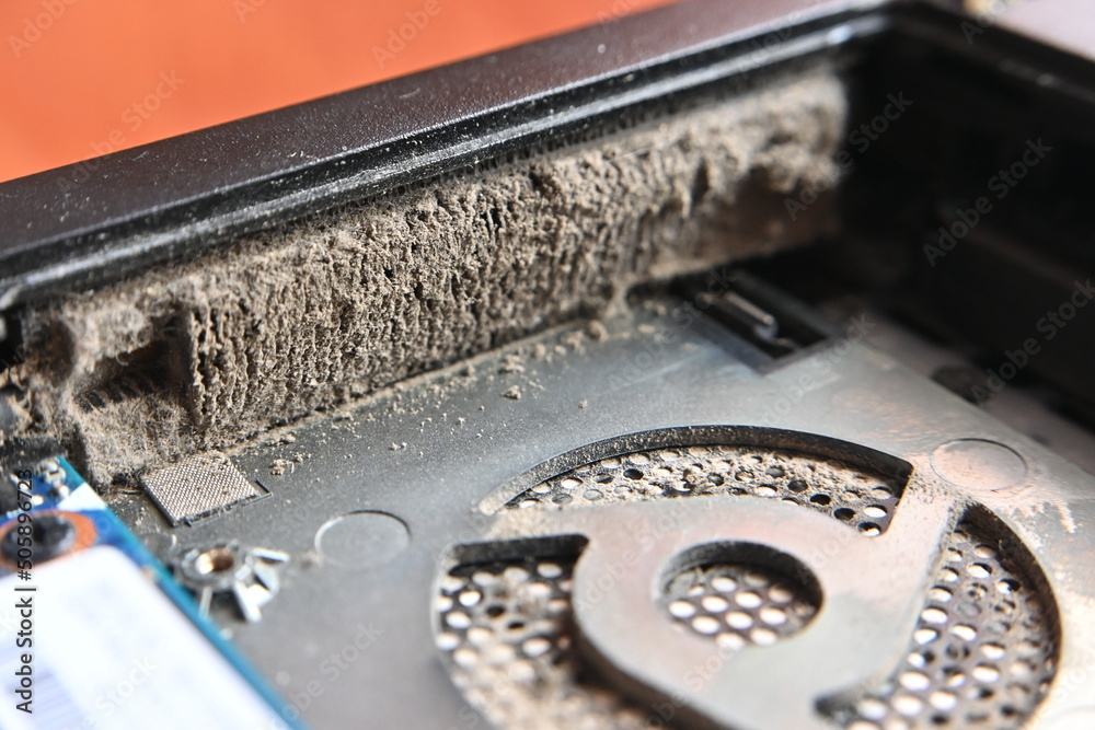 laptop radiator with dust, close-up. selective focus. laptop radiator with dust, close-up. selective focus.