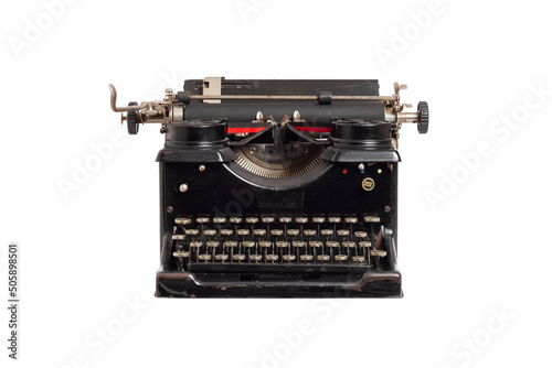Antique black typewriter front view isolated on white background