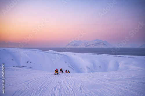 Snowmobile trip, Spitsbergen during winter time, Svalbard photo