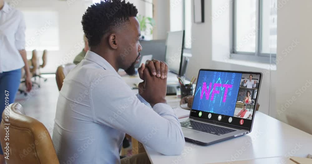 African american businessman using laptop for video call with diverse business colleagues African american businessman using laptop for video call with diverse business colleagues
