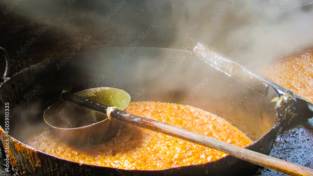 Αυτοκόλλητο large tacho of boiling molasses the main ingredient of the rapadura, the molasse