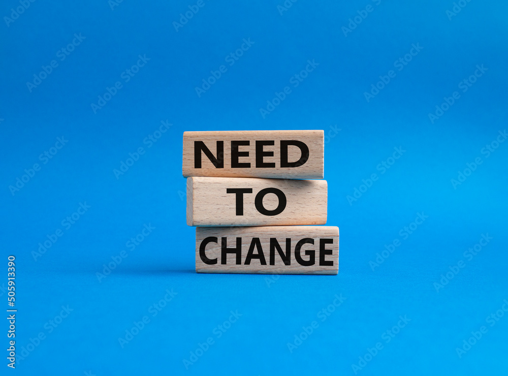 Need to change symbol. Concept words 'Need to change' on wooden blocks. Beautiful blue background. Business and Need to change concept. Copy space. Need to change symbol. Concept words 'Need to change' on wooden blocks. Beautiful blue background. Business and Need to change concept. Copy space.