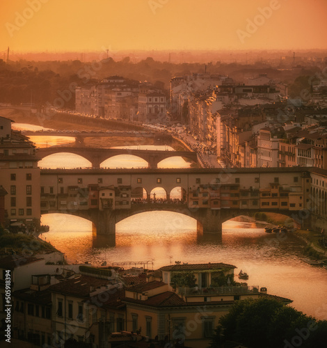 sunset at Ponte Vecchio in Florence Italy photo
