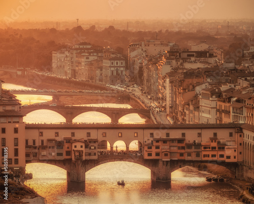 sunset at Ponte Vecchio in Florence Italy photo