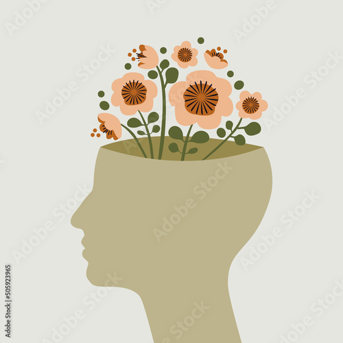 Flowers growing in human head. Concept of mental health, creativity, learning.