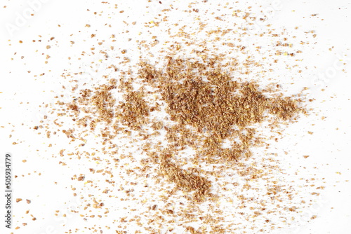 Ground, milled flaxseed, linseed flakes isolated on white  